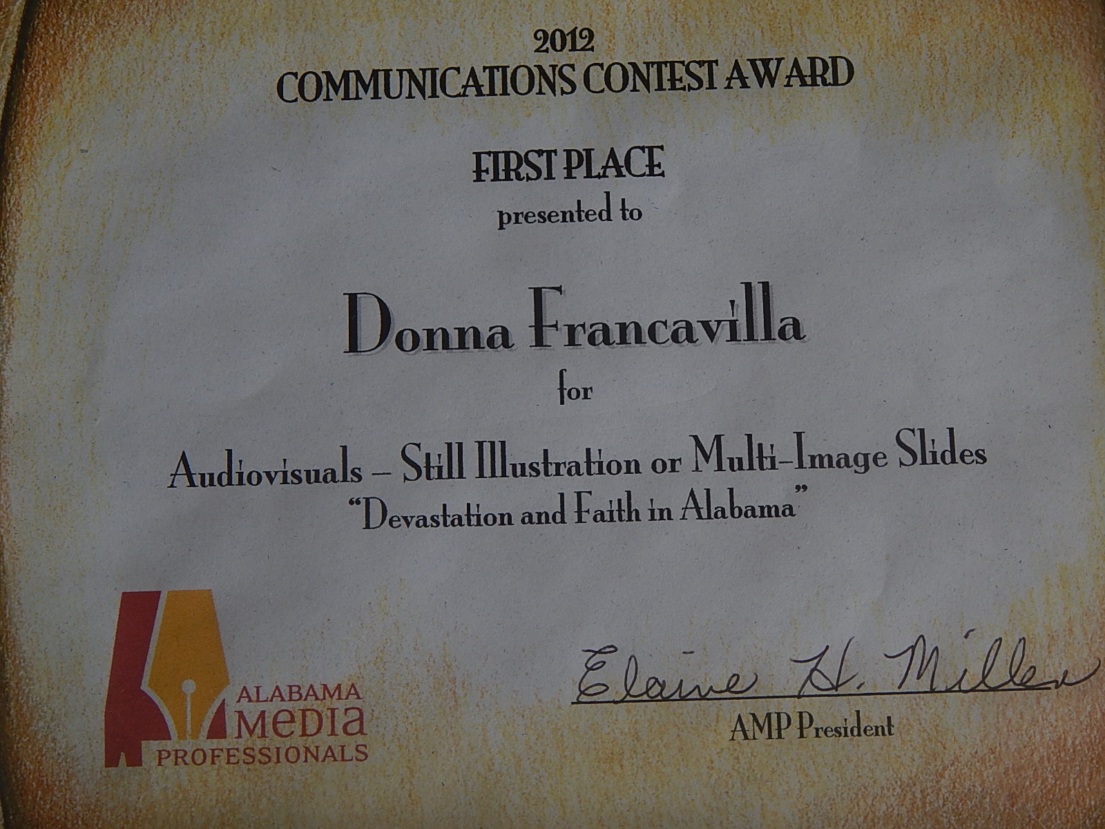 2012 Alabama Media Professionals Communications Contest Award – State Award – First Place presented to Donna Francavilla for Audiovisuals – Still Illustration or Multi-Image Slides “Devastation and Faith in Alabama”