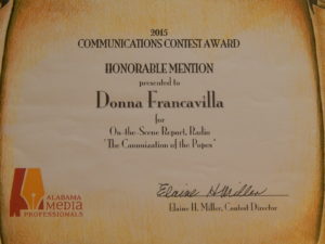 2015 Alabama Media Professionals Communications Contest Award - State Award -  Honorable Mention presented to Donna Francavilla for  On-The-Scene Report - Radio "The Canonization of the Popes"